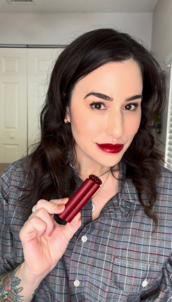 Image may contain Head Person Face Adult Cosmetics and Lipstick
